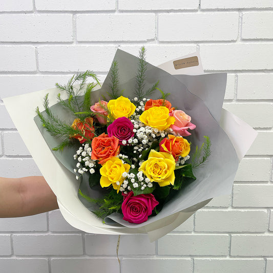 A beautiful bouquet of mixed roses and foliage available for delivery in Yamba, Maclean, Grafton and Iluka 